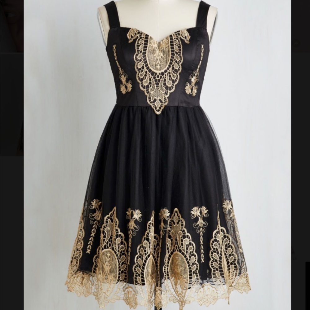 In the chandelier light dress